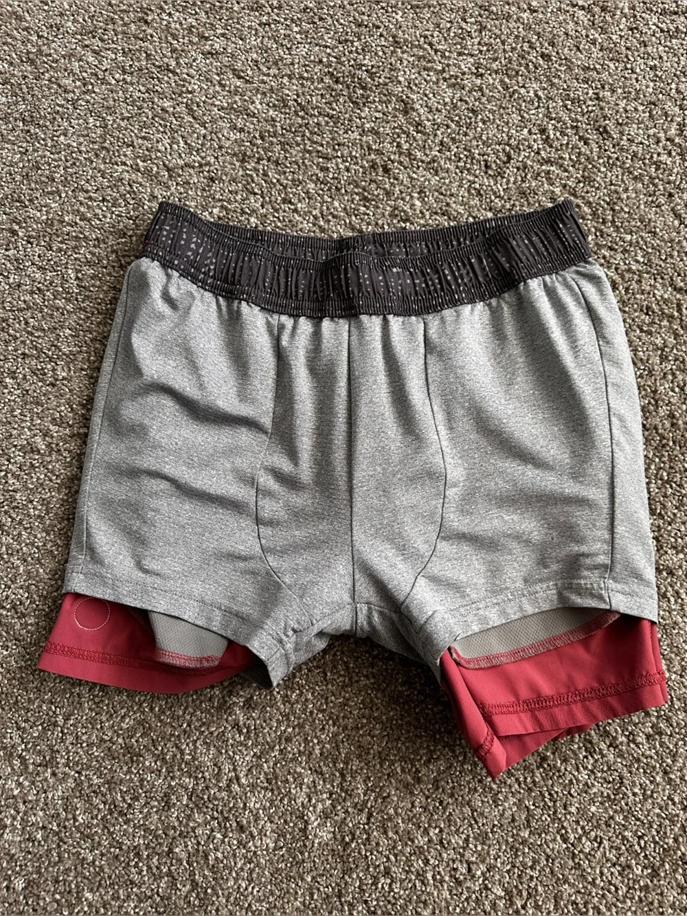 Vuori Women's Athletic Shorts in Dusty Rose with Black Waistband